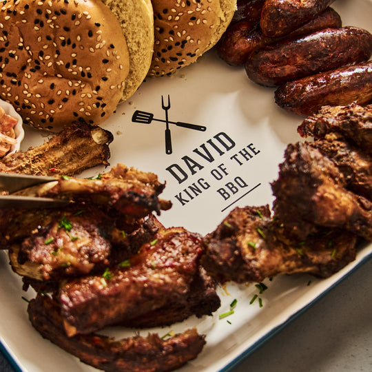 Platter of grilled meats and buns with &