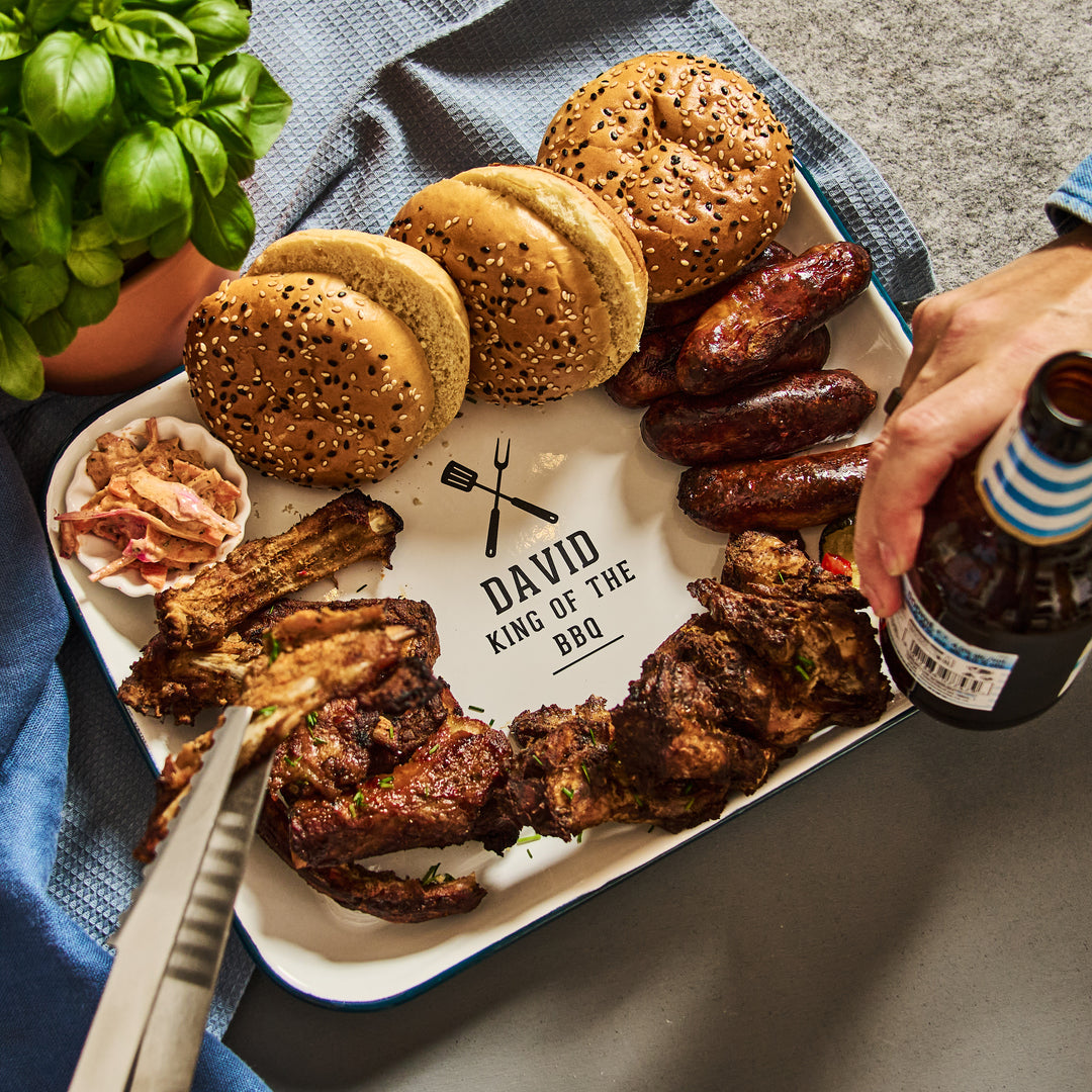 Platter of grilled meats and buns with &