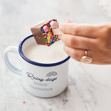 Personalised Enamel Rainbow Mug Making Hot Chocolate