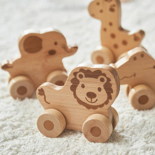 Set Of Four Push Along Wooden Toy Animals