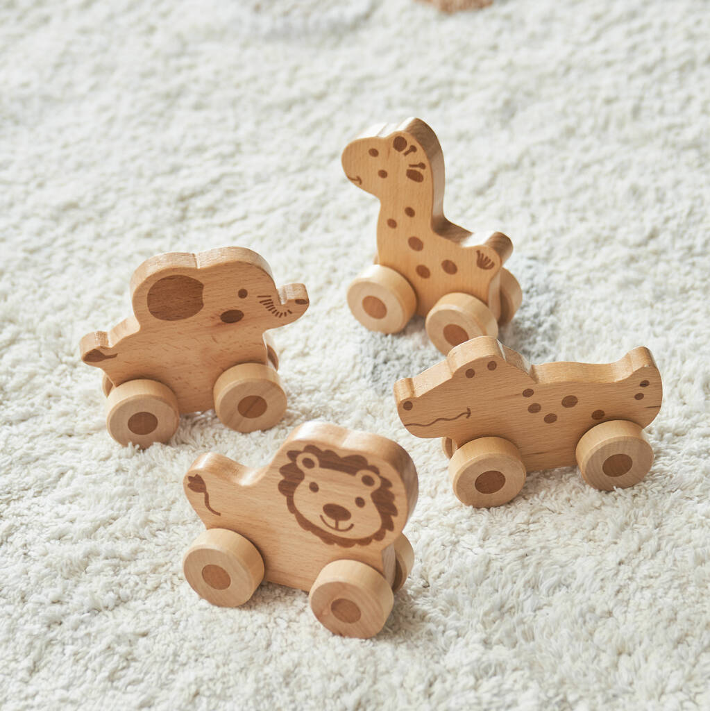 Set Of Four Push Along Wooden Toy Animals