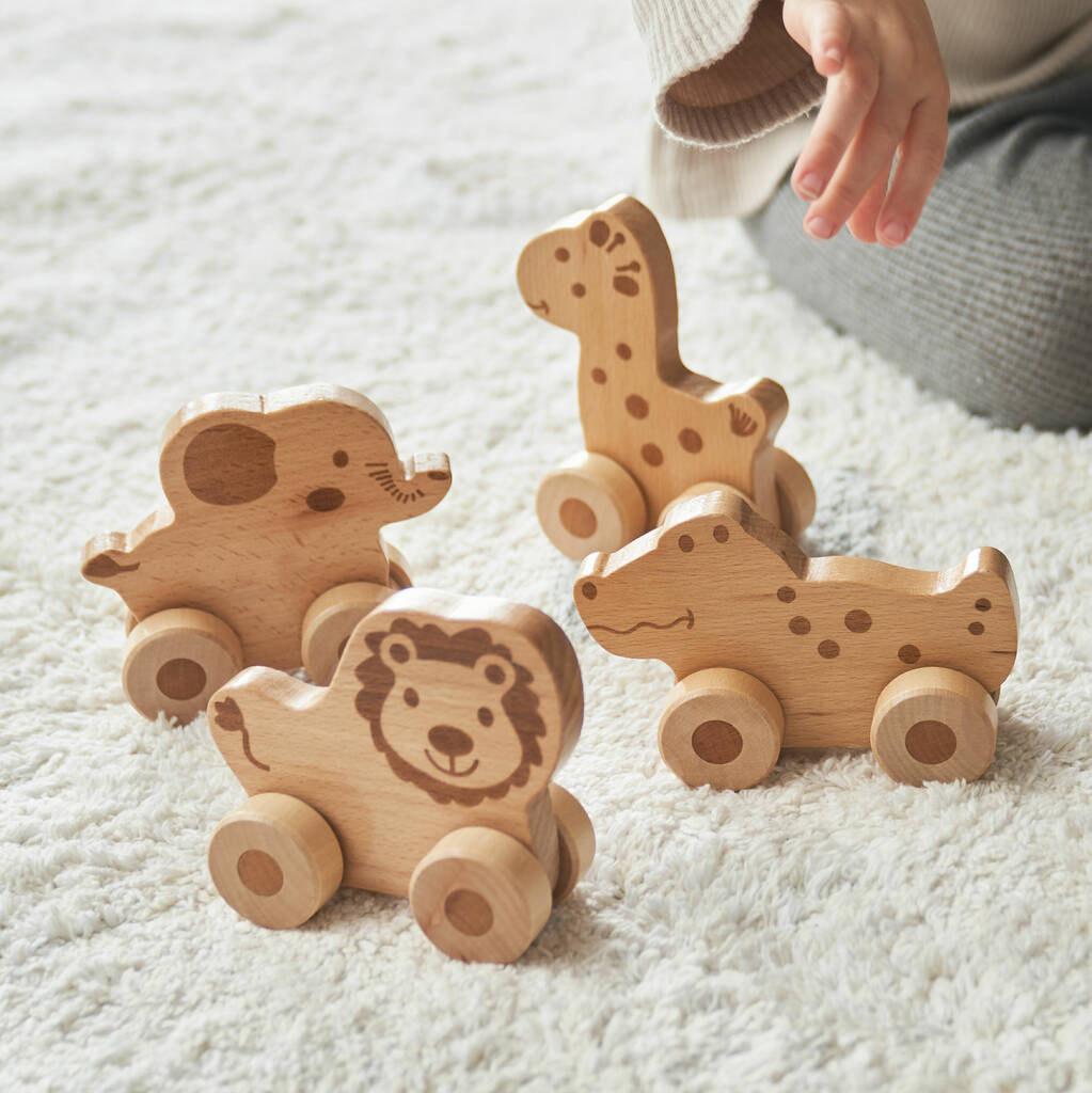 Set Of Four Push Along Wooden Toy Animals